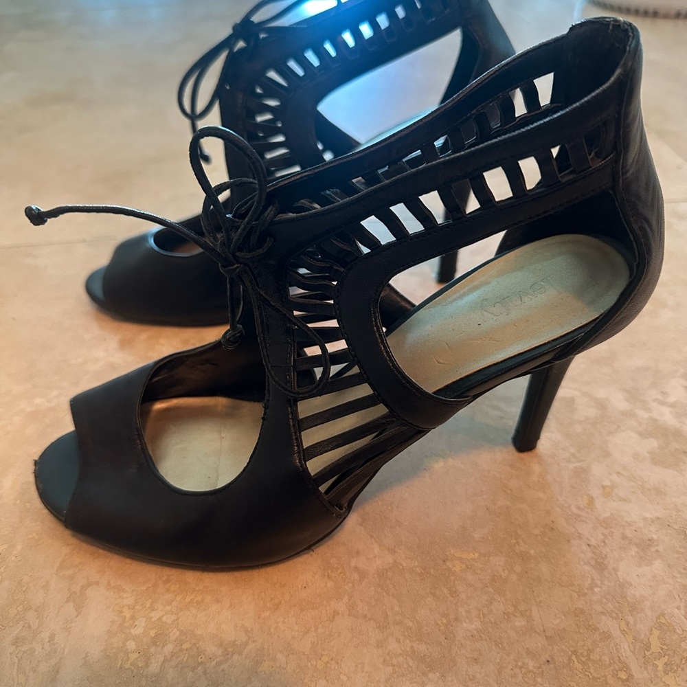 Levity Black Heels with Intricate Cut-Out Design and High Thin Heel